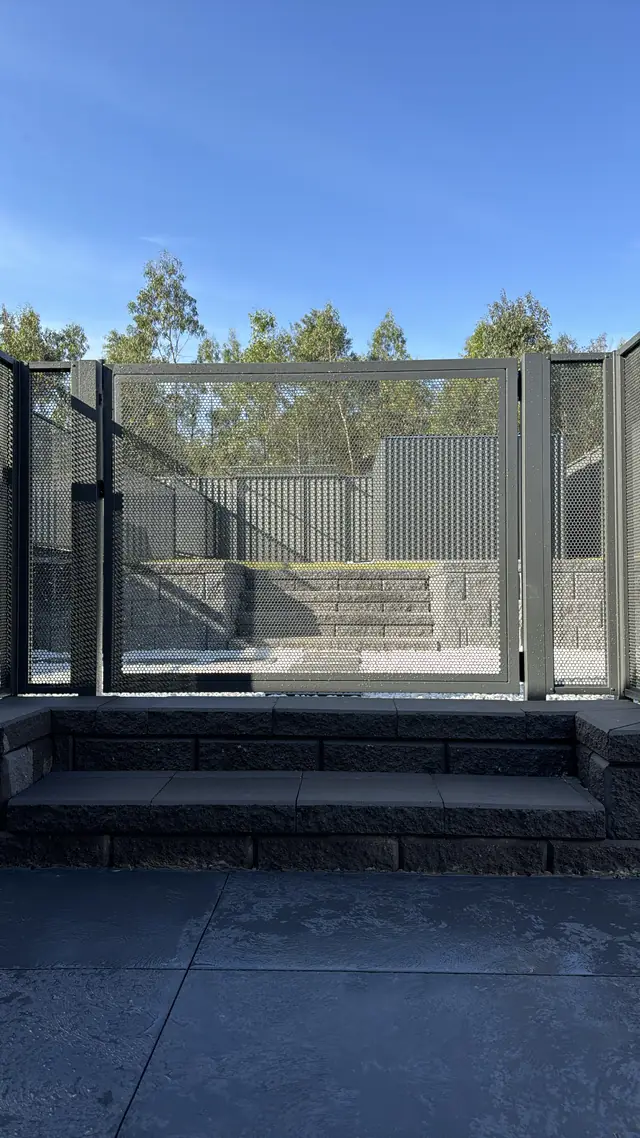 A Monument PurePerf gate at the top of a set of steps
