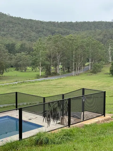Black Gum design panels on a rural property in New South Wales, looking out over paddocks and hills