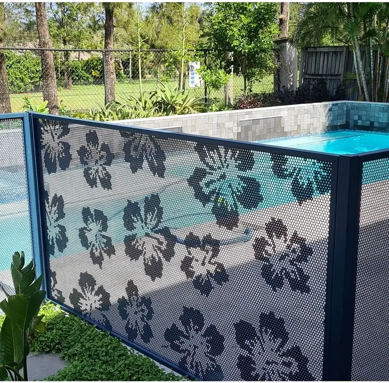 Deep blue Hibiscus design panels around a raised pool, the open flowers spread across each panel