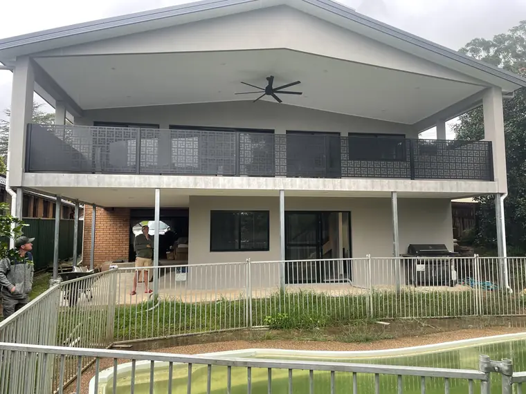 Black Nahosh design balustrade panels along the first floor balcony of a home in New South Wales