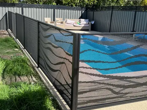 Black Wave design panels along a pool, the rolling lines running across each panel