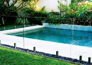 A clean frameless glass pool fence on the day it was installed
