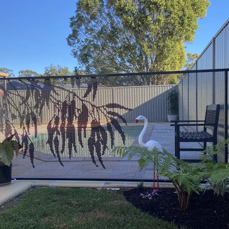 A Gum design pool fence in Textured Surfmist, gum leaves cut into the panel