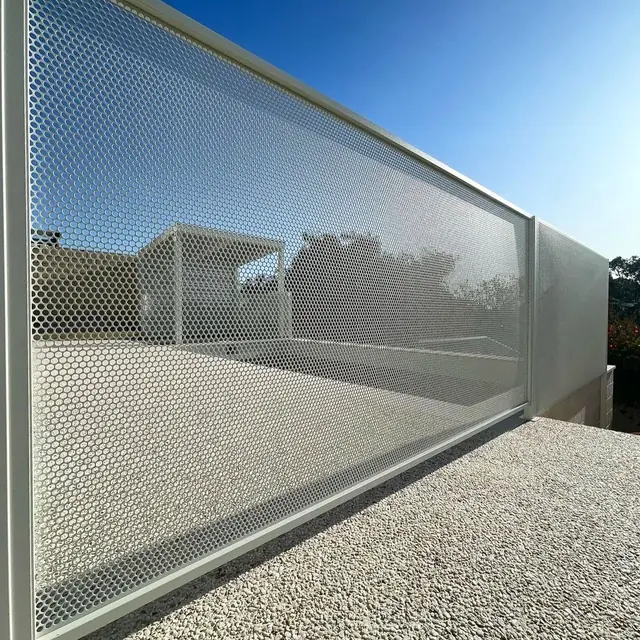 Close up of a white Pure Perf panel against a blue sky