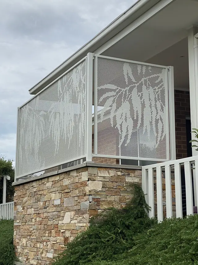 A white Gum design panel on the corner of a verandah